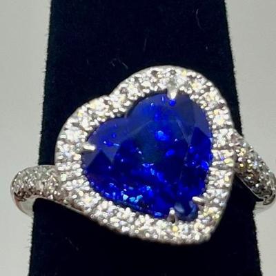 Sale Photo Thumbnail #211: Designer: Bruno Crivelli, Blue heart Sri Lanka sapphire (graded & certified with HKD report, included) with a halo of 94 diamonds 0.64cts, "G-H" color, "VS" clarity. Appraisals included. $12,500.00