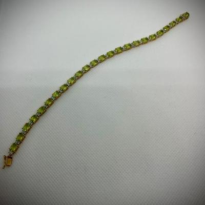 Sale Photo Thumbnail #34: Peridot bracelet in 18K $585.00