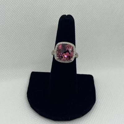 Sale Photo Thumbnail #203: 14k gold with synthetic tourmaline in a halo of 0.25cts "G-H" color, "SI-1I" clarity. Appraisal included.  $600.00