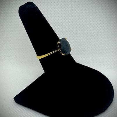 Ink sapphire in 14k gold band 
