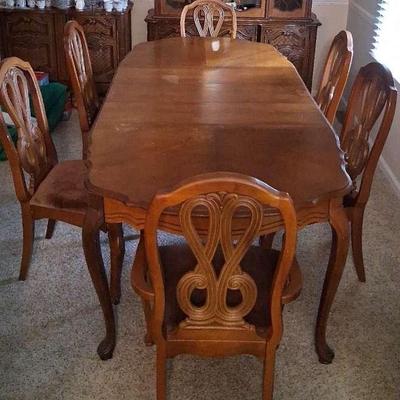 Ornate Dining Table with Six Carved Chairs