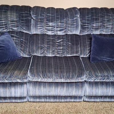 Blue Upholstered Reclining Sofa with Pillows