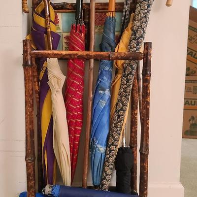 Faux Bamboo Umbrella Stand with Decorative Floral Tiles and Umbrella Assortment