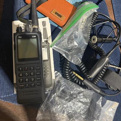 PJ2 COM Handheld Aviation Radio with Operator Manual + Headset Jacks + Power Station 