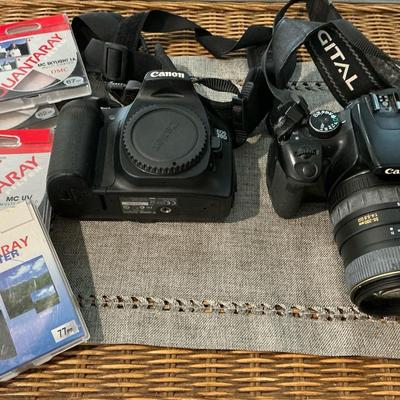 Cannon EOS 3D , Cannon Rebel XTI And Polaroid 