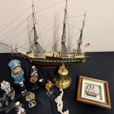 Lot 224: Nautical Collection ( USS Constitution Model, Titanic Bell, Sailor Figurines)