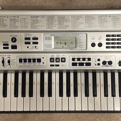 Lot 353: Casio LK-92TV 61-Key Keyboard – Key Lighting System – SmartMedia – Tested with Power Cord  
