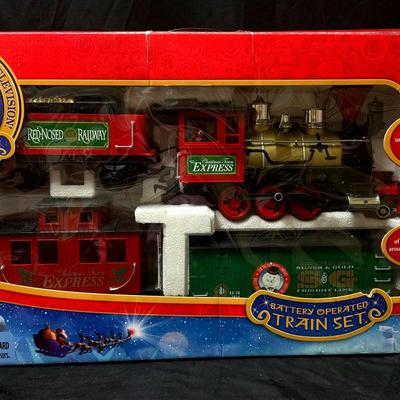 Lot 455: Rudolph the Red-Nosed Reindeer 50th Anniversary Battery Operated Train Set – Like New