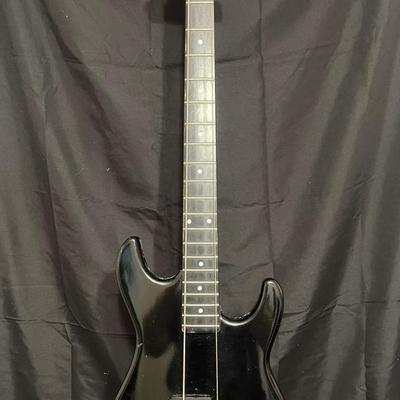 Lot 350: Cruise Electric Bass Guitar – Black – Created for VMI