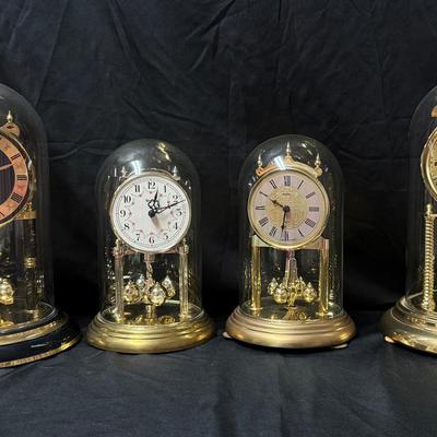 Lot 401: Lot of 4 Vintage Quartz Anniversary-Style Dome Clocks – Dunkel, Elgin, Bulova, and Westclox