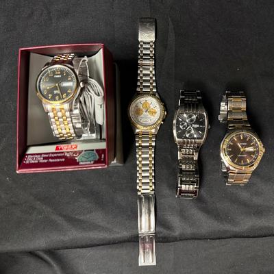 Lot 406: Lot of 4 Men’s Watches – Timex (NIB), Pulsar Chronograph, Armitron Stainless & Two-Tone