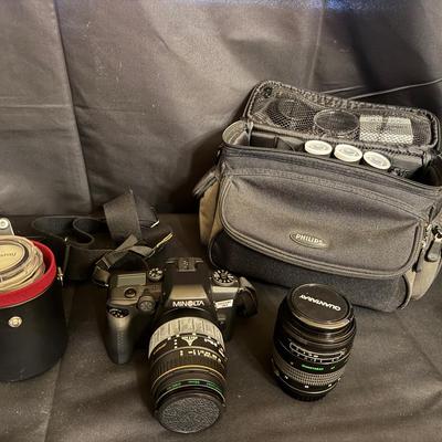 Lot 250: Minolta Maxxum 70 35mm SLR camera With Two 55mm Quantaray Lenses And Several AF Lenses