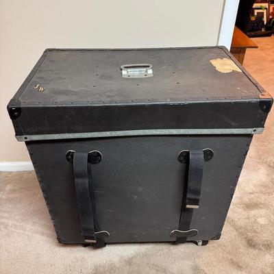 Lot 282: Vintage Wheeled Fiberboard  Instrument Trunk 