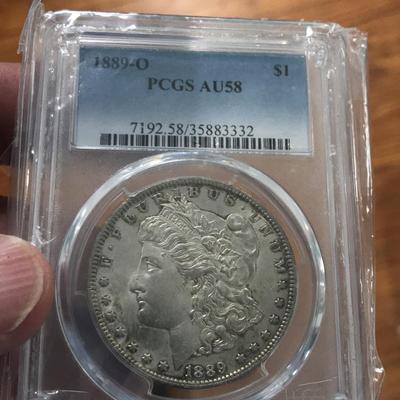 1889-O Morgan Dollar AU58