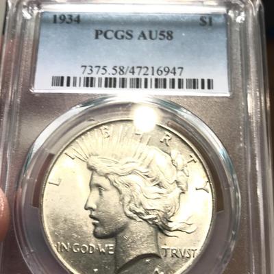 1934 Peace Dollar AU58 PC65