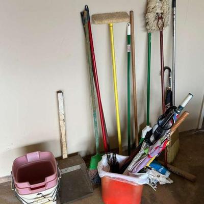 KAS055- Variety of More Brooms, Mops, And Umbrellas 