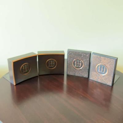 Two Sets Of Bronze Book Ends With The “W“ Initial