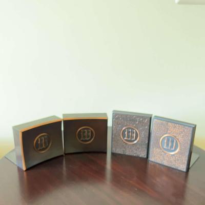 Two Sets Of Bronze Book Ends With The “W“ Initial