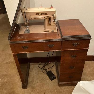 Vintage 1951 Montgomery Ward  sewing cabinet and Singer sewing machine