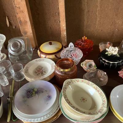 Assorted vintage serving dishes and midcentury canisters