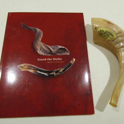 Sale Photo Thumbnail #225: Shofar horn instrument with book