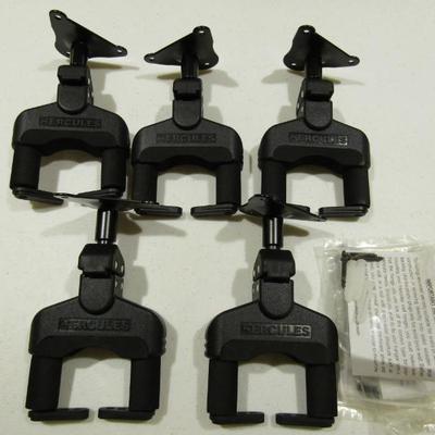 Sale Photo Thumbnail #125: Hercules wall mount guitar holders