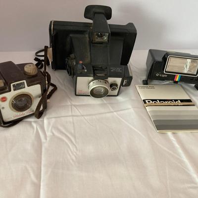 Lot of Vintage Cameras – Kodak Brownie Holiday Flash, Polaroid Land Camera, and Accessories