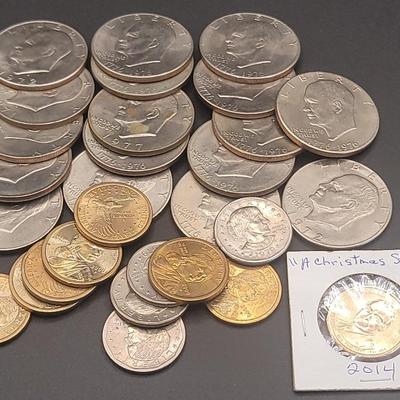 17 1970s Eisenhower dollars, 7 Sacagawea dollars, 4 Susan B Anthony, & 1 Harding Christmas dollar
