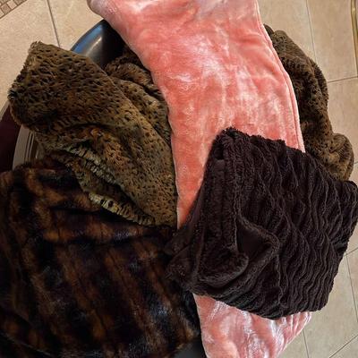 Four Plush Throw Blankets