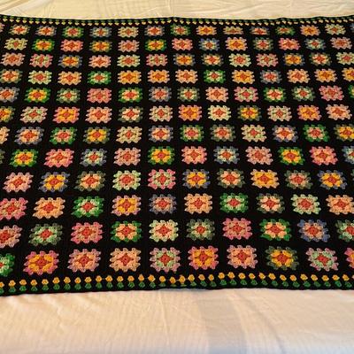 Handmade Granny Square Crochet Blanket With Black Background 