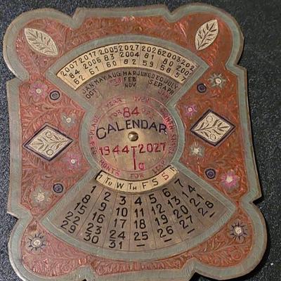 1944 - 1927 Metal Desk Calendar Spanning 84 Years