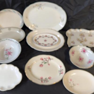 Assortment Of Various Serving Platters, Bowls, And Dishware