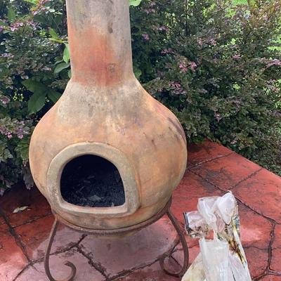 Rustic Clay Chiminea with Sturdy Metal Base