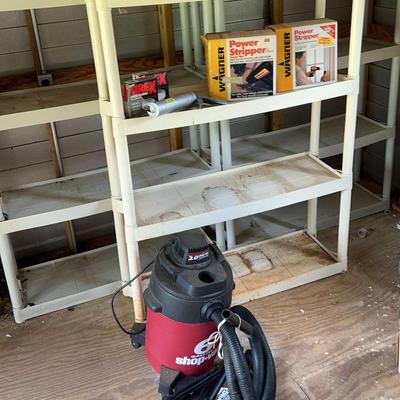 Three Plastic Shelves with Shop-Vac and Power Strippers