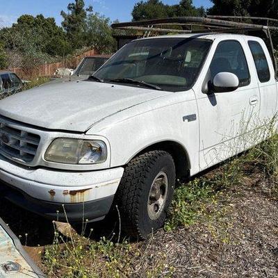 Sale Photo Thumbnail #11: #100 • 1999 Ford F-150 Pickup Truck

