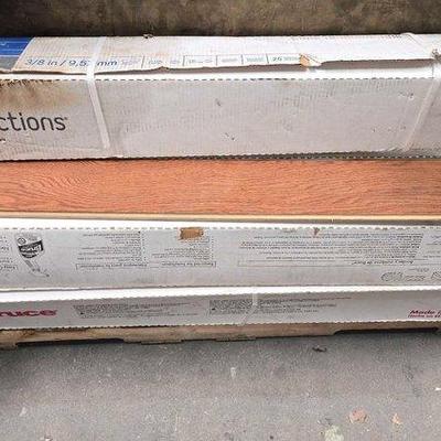 2306 • (5) boxes of wood flooring