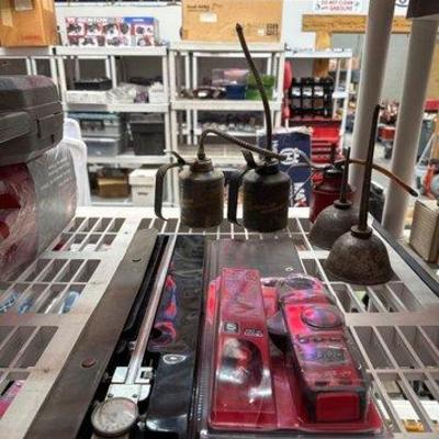2182 • oil cans, dial caliper and milwaukee 400 amp clamp meter