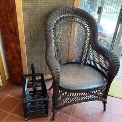nice vintage wicker chair and 60's bamboo mag rack.