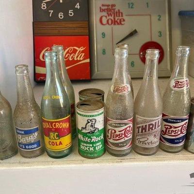 #2535 • (8) Glass Bottles and (3) Soda Cans
