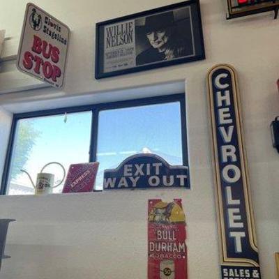 #1770 • Willie Nelson Concert Poster, Chevrolet Sales and Service sign, bus stop sign and more
