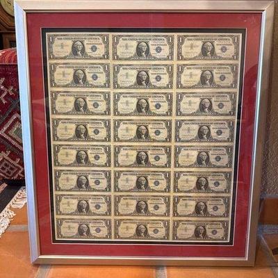 #7016 • 24 Framed 1957 $1 Silver Certificates
