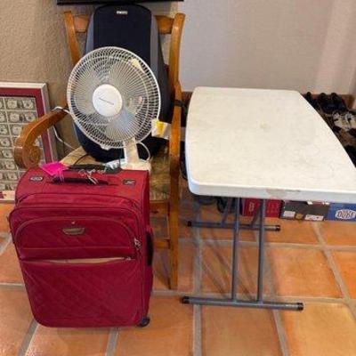 #7018 • Wooden Chair, Homedics Back Massager, Fan, Suitcase, Table, Wall Decor
