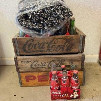 #2190 • Coca-Cola Bottles, Crates, and Blanket
