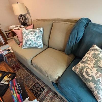 Sofa is sage/gray. Teal slipcover can be included or not. 