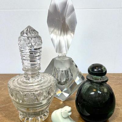 Trio of perfume bottles