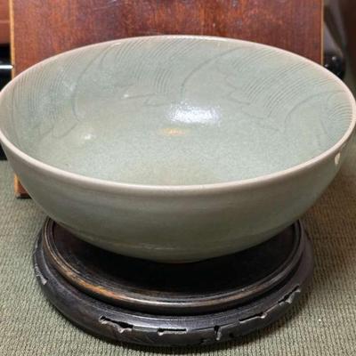 Celadon glazed stamped ceramic bowl