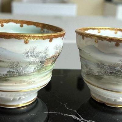 A pair of kutani ware pinched" bowls