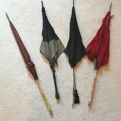 Antique parasols for repair