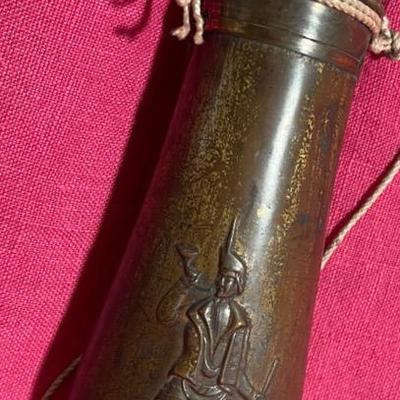 Antique metal powder horn