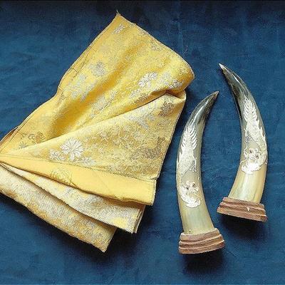 Hand carved horns and decorative fabric